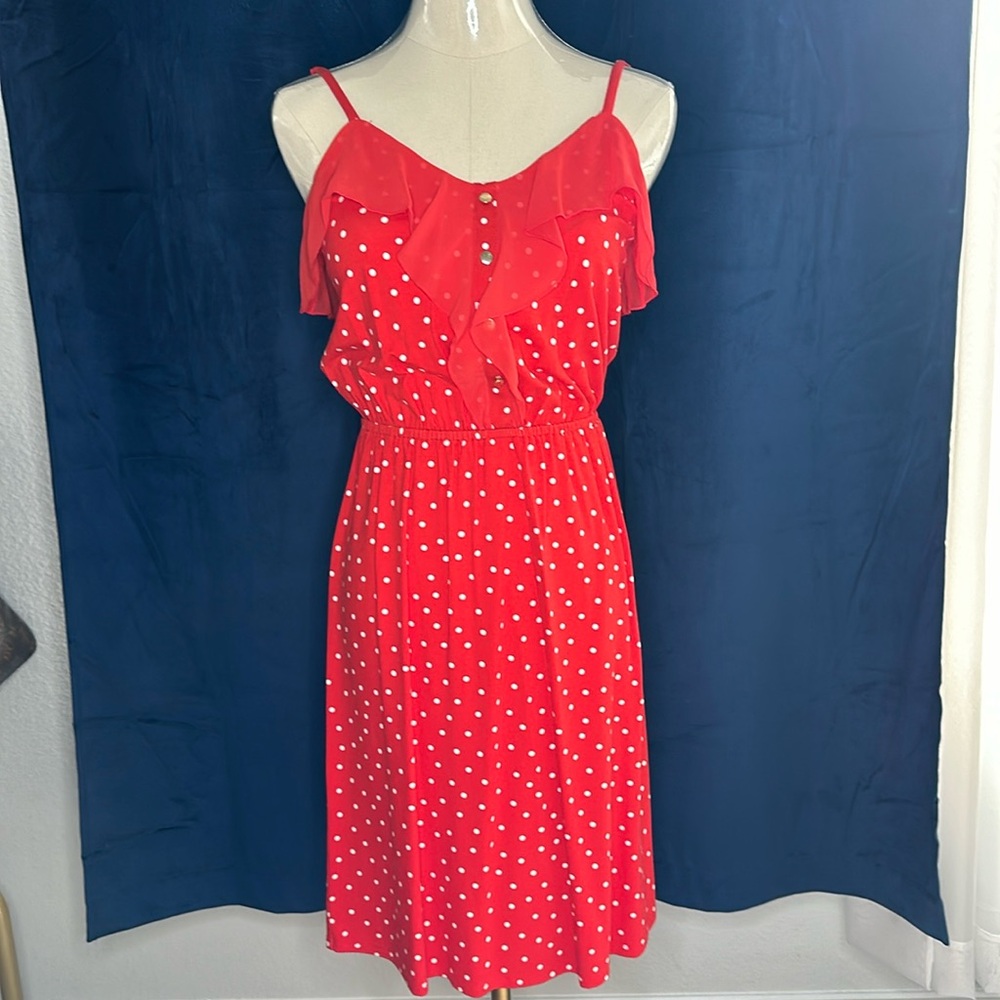 Elle red polkadot dress.